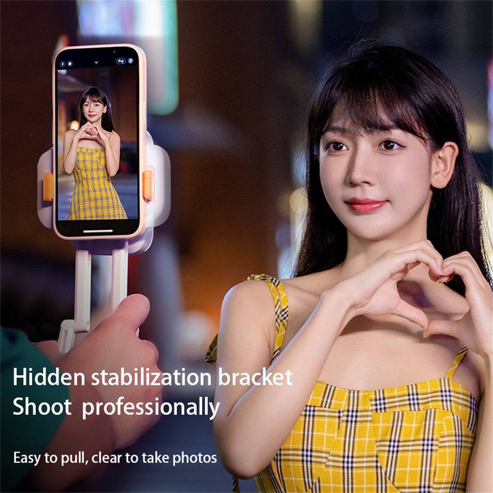 a woman holding a cell phone up to her face