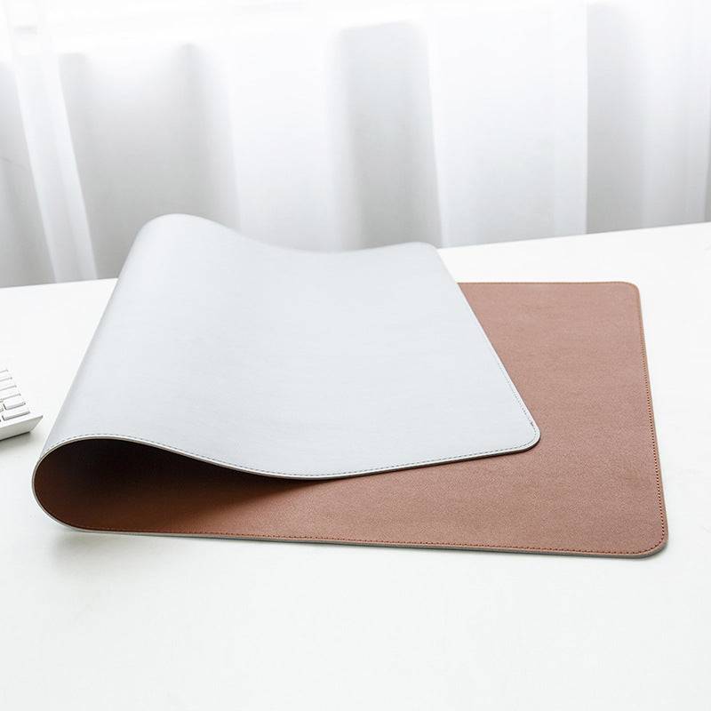 a close up of a mouse pad on a desk